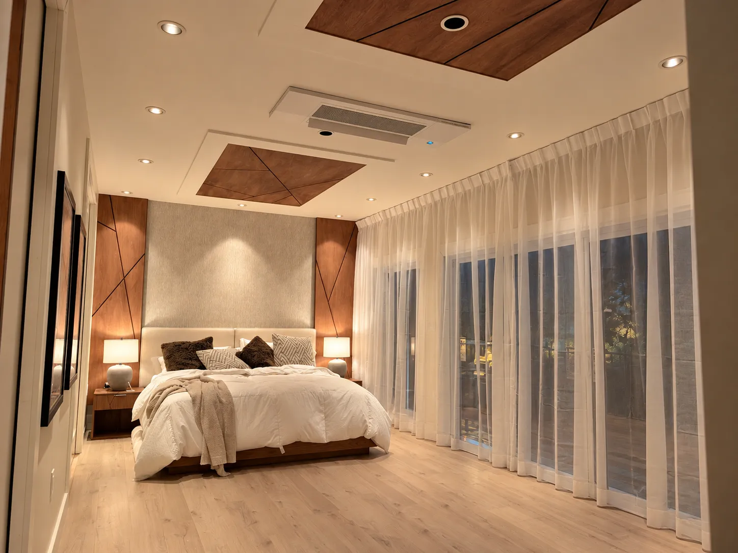 The primary suite in the evening